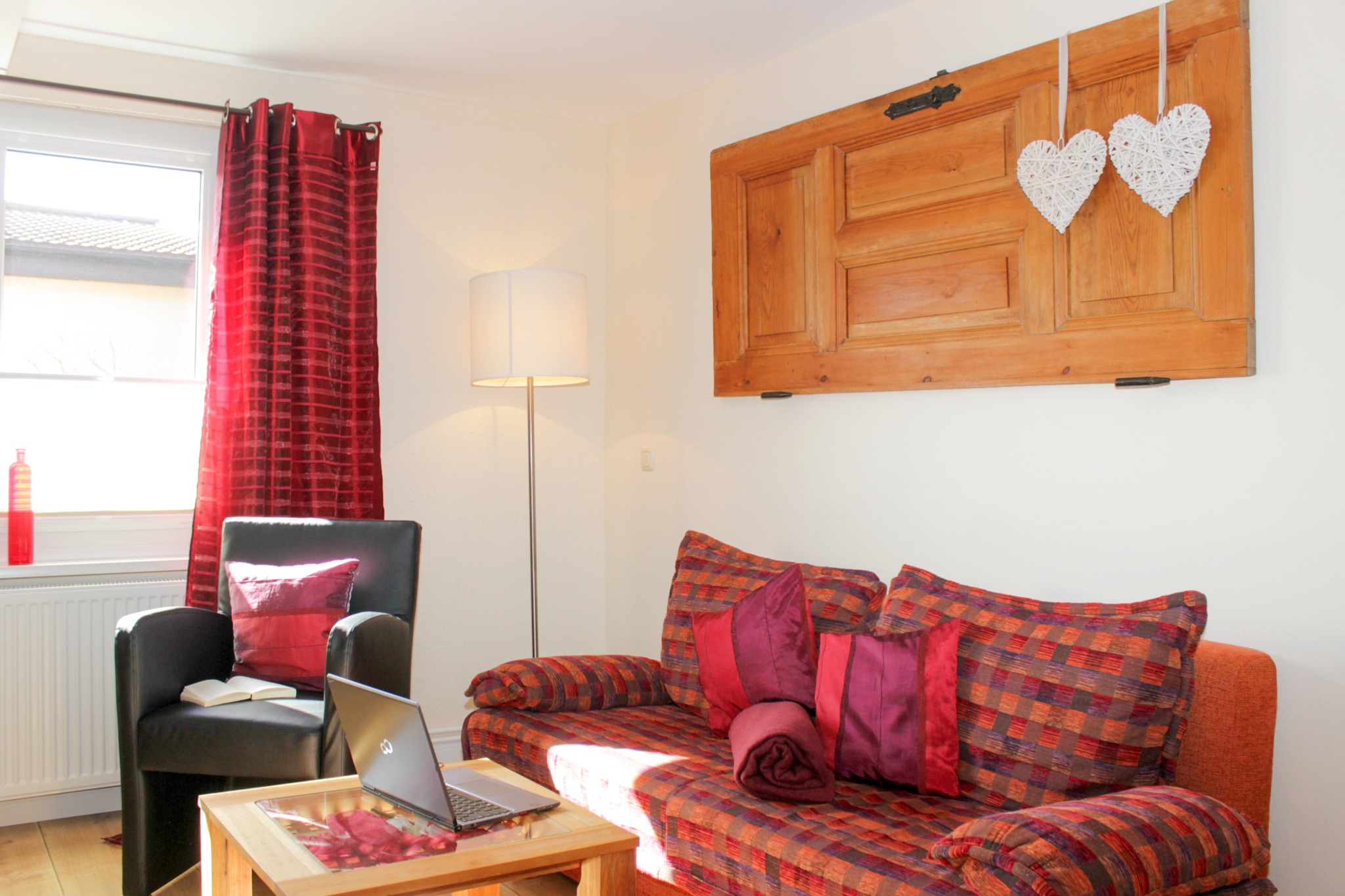 Christa – Wohnbereich mit Sofa und Sessel